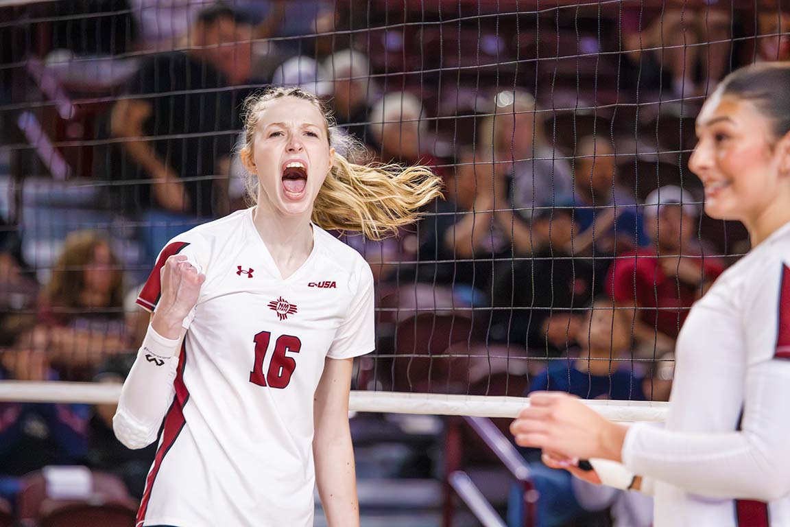 NMSU blocker Kate Sinclair celebrates after the Aggies scored a point against UNM during the Battle of I-25 on September 17, 2025.
