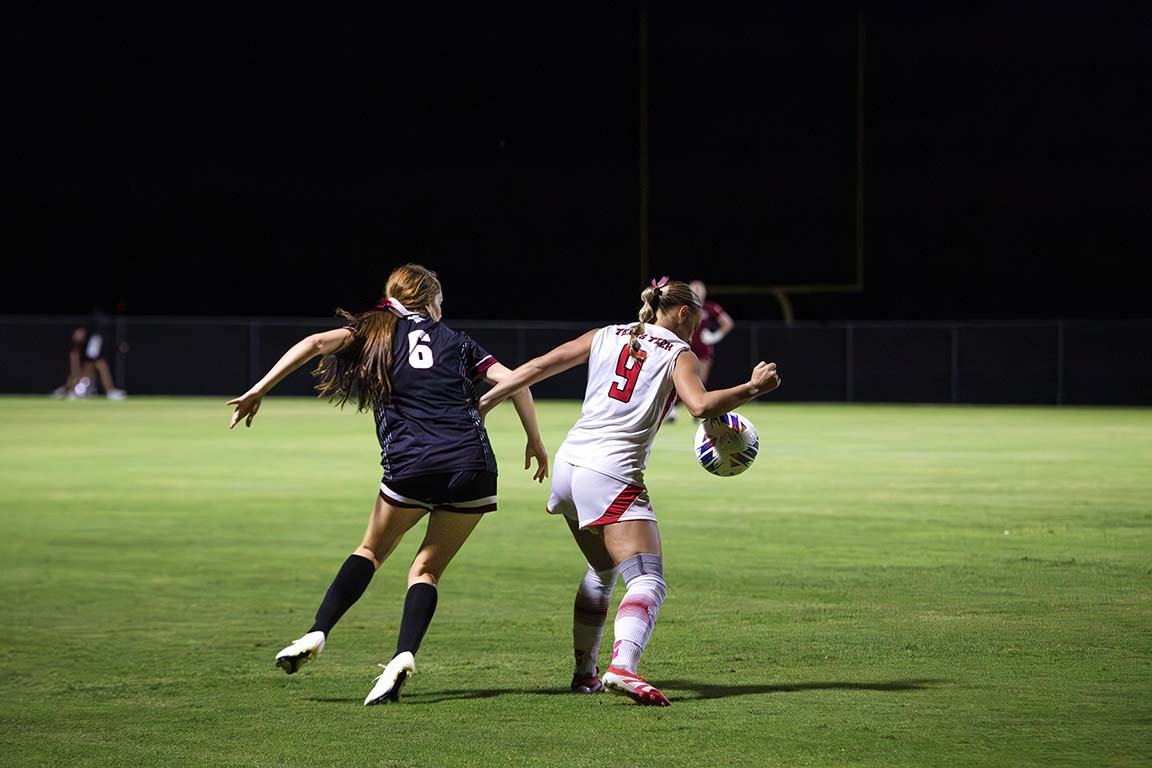 New Mexico State forward Ariana Leamons fights to steal the ball from a Texas Tech player during Thursday's match on September 9, 2025.  