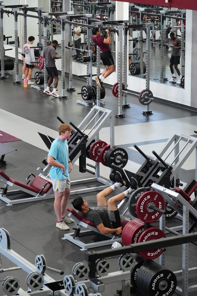 NMSU students using Activity Center's new workout equipment.