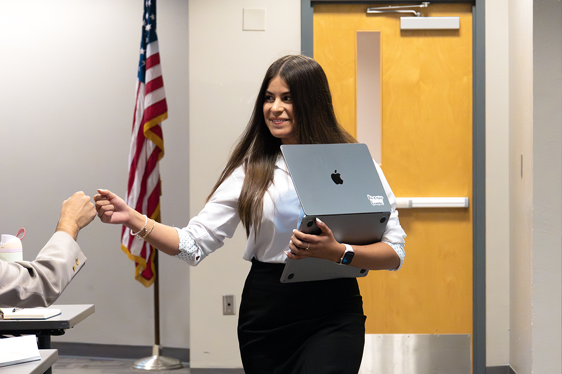 Senator Anette Vera fist bumps another senator after getting her bill passed through the ASNMSU senate on Thursday, Oct. 2, 2025.