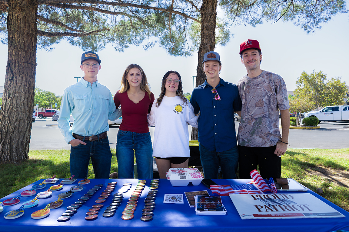 Turning Point members tabling outside Corbett Center Student Union, listed left to right: Ketch Bays, Madison Miller, Eden Harless, Rylan Anderson, Caden Hart. Oct. 16, 2025. 