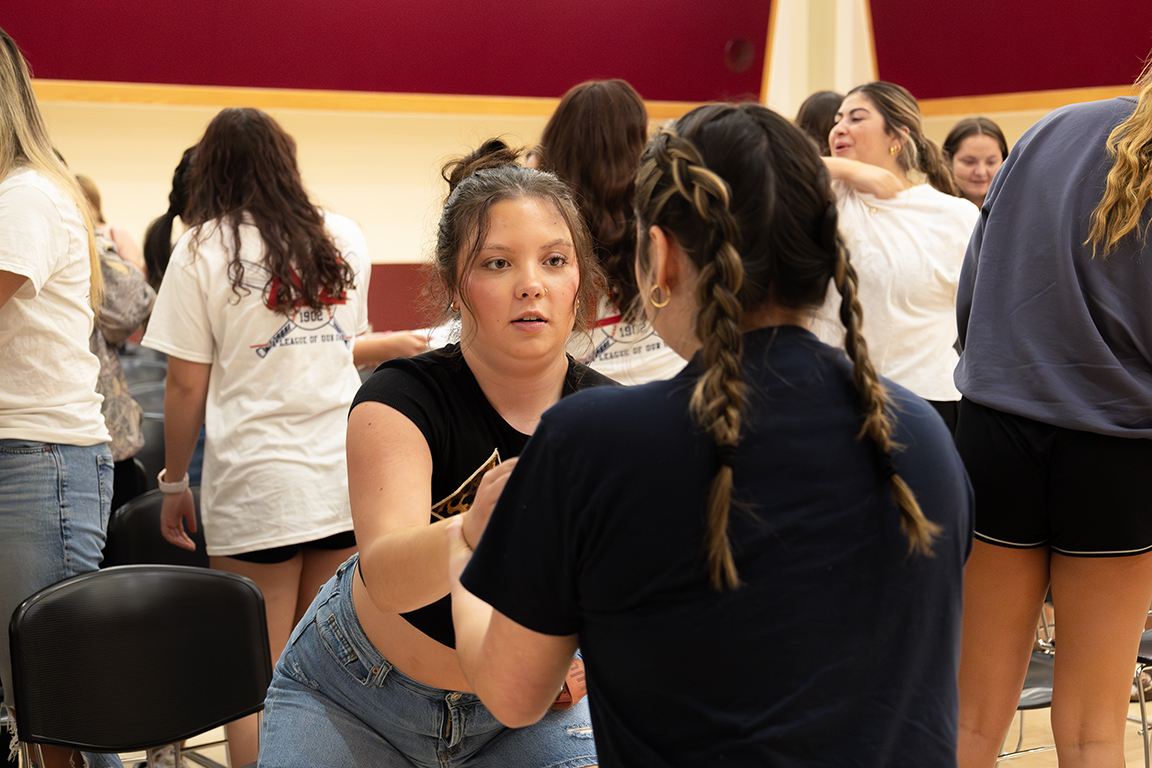 Two NMSU Panhellenic members focus on practicing self-defense tips in the Corbett Center Student Union Ballrooms. Sept. 24, 2025. 