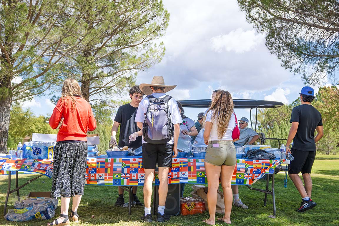 Students and staff gather for food at the International Club's Around the World Festival on September 16, 2025. 