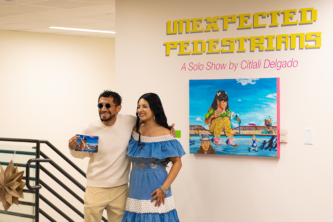 Citlali Delgado poses for a photo with Arik Ruiz-Guevara, owner of NMSU’s Alma’s Kitchen. Nov. 22, 2025. 