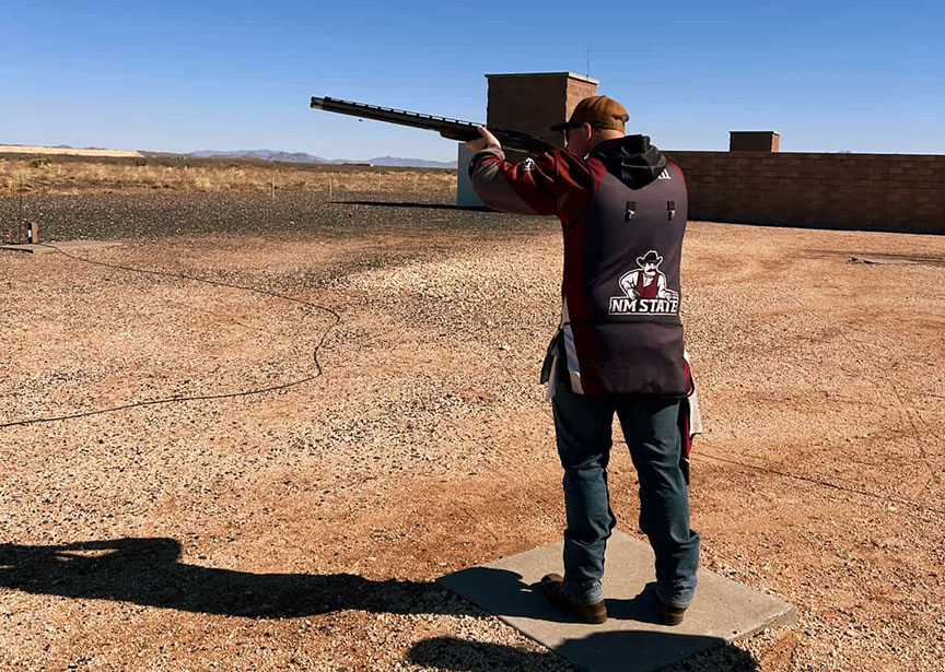 An Aggie Trap and Skeet team member focuses while shooting during a practice session.