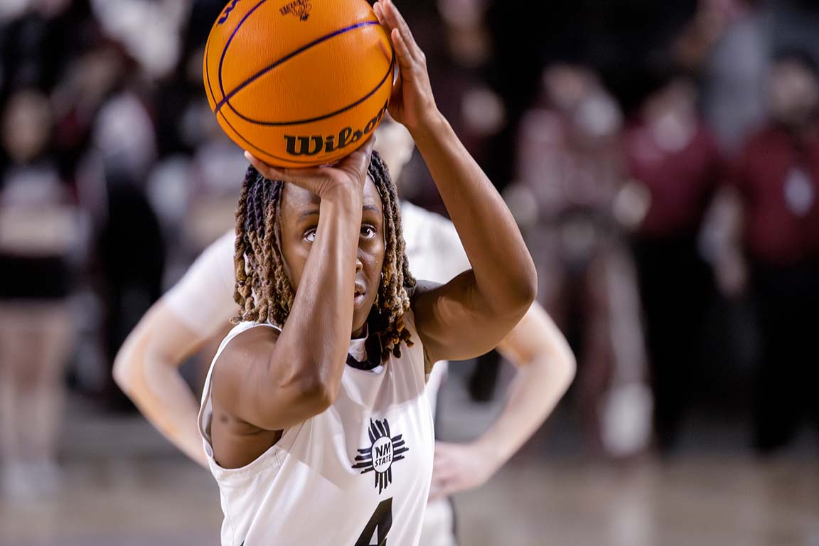 DeAvion Wilson (4) attempts a free throw for New Mexico State following a foul during the rivalry game. Feb. 21, 2026.
