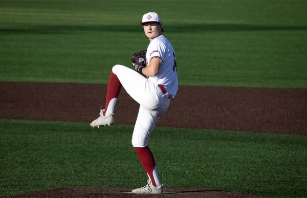 Colton Sneddon, a right-handed pitcher, delivers a focused pitch from the mound. April 17, 2026  