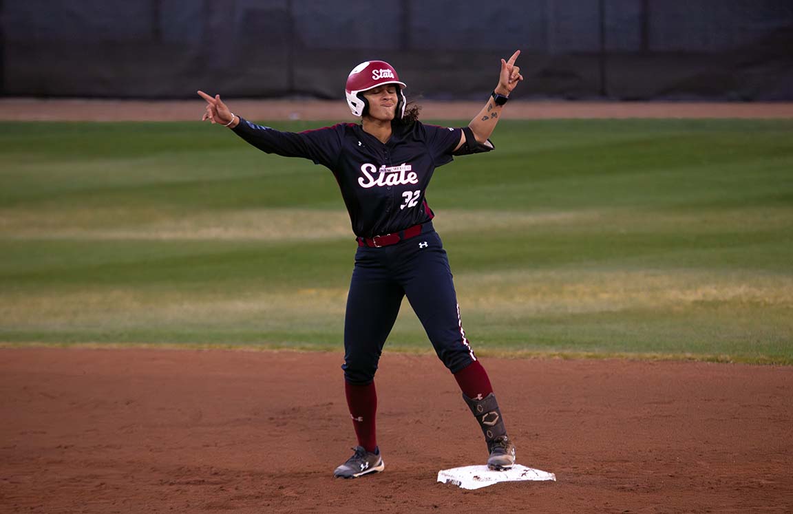 Player celebrates on base, March 27, 2026.  