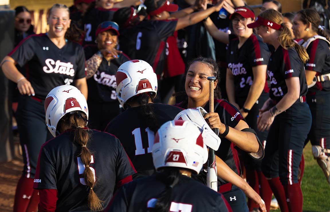 Teammates celebrate a play, March 27, 2026.  