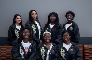 Seven members of the newest sorority at NMSU, Alpha Kappa Alpha (AKA), pose for a picture in the Aggie lounge. April 28, 2026.  