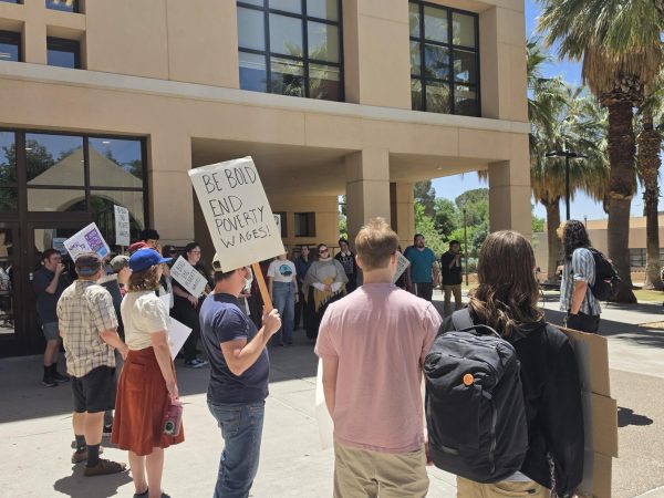 Graduate workers and supporters gather outside of Zuhl Library. May 7, 2026.