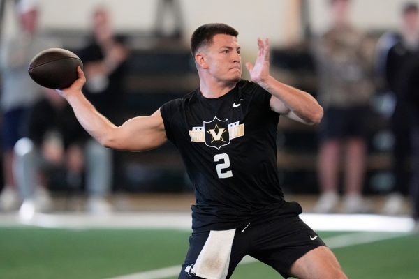 Vanderbilt quarterback Diego Pavia looks to throw a pass during the school's NFL football pro day Friday, March 20, 2026, in Nashville, Tenn. 